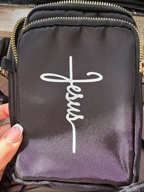 Black Crossbody Pouch with White Script says Jesus